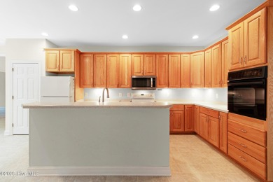 This stately brick home in Brandywine Bay enjoys a prime setting on Brandywine Bay Golf Club in North Carolina - for sale on GolfHomes.com, golf home, golf lot