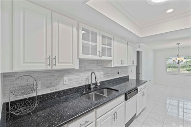 Welcome home to this spacious 2-bedroom, 2-bath residence that on Falcon Watch Golf Club in Florida - for sale on GolfHomes.com, golf home, golf lot