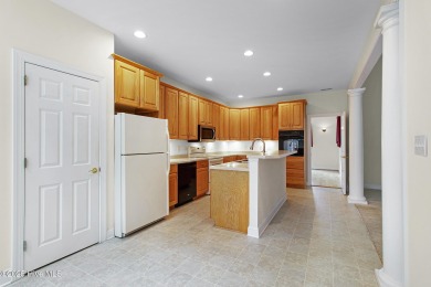 This stately brick home in Brandywine Bay enjoys a prime setting on Brandywine Bay Golf Club in North Carolina - for sale on GolfHomes.com, golf home, golf lot