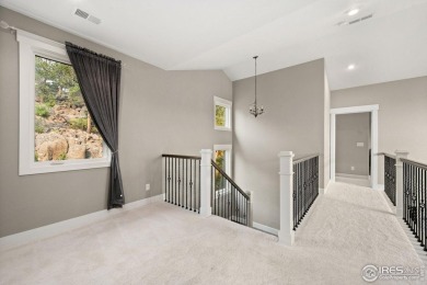 Welcome to this stunning mountain retreat nestled on the 17th on Fox Acres Country Club in Colorado - for sale on GolfHomes.com, golf home, golf lot