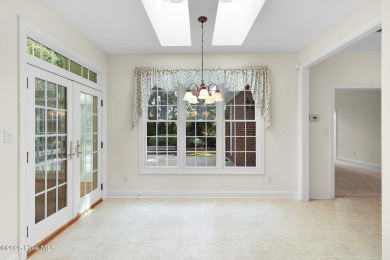 This stately brick home in Brandywine Bay enjoys a prime setting on Brandywine Bay Golf Club in North Carolina - for sale on GolfHomes.com, golf home, golf lot