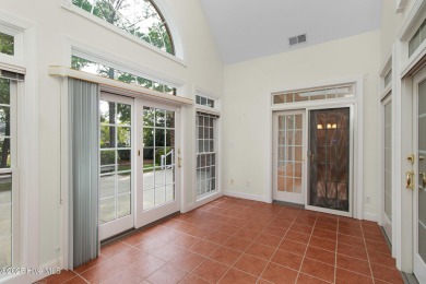 This stately brick home in Brandywine Bay enjoys a prime setting on Brandywine Bay Golf Club in North Carolina - for sale on GolfHomes.com, golf home, golf lot