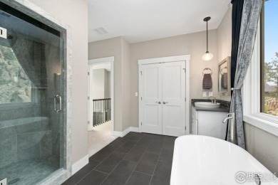 Welcome to this stunning mountain retreat nestled on the 17th on Fox Acres Country Club in Colorado - for sale on GolfHomes.com, golf home, golf lot