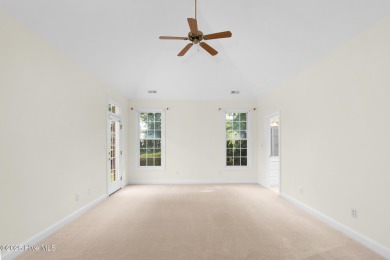 This stately brick home in Brandywine Bay enjoys a prime setting on Brandywine Bay Golf Club in North Carolina - for sale on GolfHomes.com, golf home, golf lot