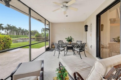 Lovely one-story, 3-bedroom + office home with lake and golf on St. Andrews Country Club of Boca Raton in Florida - for sale on GolfHomes.com, golf home, golf lot