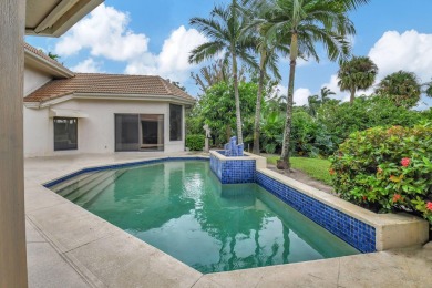 Lovely one-story, 3-bedroom + office home with lake and golf on St. Andrews Country Club of Boca Raton in Florida - for sale on GolfHomes.com, golf home, golf lot