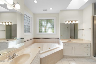 This stately brick home in Brandywine Bay enjoys a prime setting on Brandywine Bay Golf Club in North Carolina - for sale on GolfHomes.com, golf home, golf lot