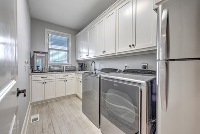 Some homes possess an intangible quality that sets them on Coosaw Creek Country Club in South Carolina - for sale on GolfHomes.com, golf home, golf lot