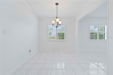 Welcome home to this spacious 2-bedroom, 2-bath residence that on Falcon Watch Golf Club in Florida - for sale on GolfHomes.com, golf home, golf lot