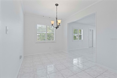 Welcome home to this spacious 2-bedroom, 2-bath residence that on Falcon Watch Golf Club in Florida - for sale on GolfHomes.com, golf home, golf lot