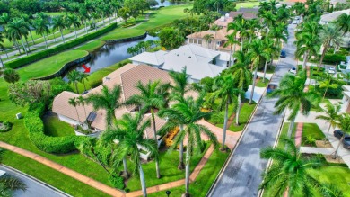 Lovely one-story, 3-bedroom + office home with lake and golf on St. Andrews Country Club of Boca Raton in Florida - for sale on GolfHomes.com, golf home, golf lot