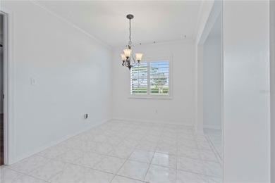 Welcome home to this spacious 2-bedroom, 2-bath residence that on Falcon Watch Golf Club in Florida - for sale on GolfHomes.com, golf home, golf lot