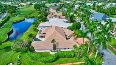 Lovely one-story, 3-bedroom + office home with lake and golf on St. Andrews Country Club of Boca Raton in Florida - for sale on GolfHomes.com, golf home, golf lot