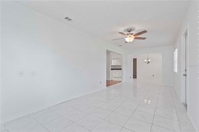 Welcome home to this spacious 2-bedroom, 2-bath residence that on Falcon Watch Golf Club in Florida - for sale on GolfHomes.com, golf home, golf lot