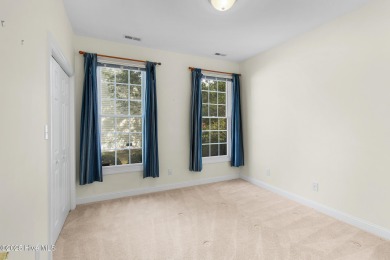This stately brick home in Brandywine Bay enjoys a prime setting on Brandywine Bay Golf Club in North Carolina - for sale on GolfHomes.com, golf home, golf lot
