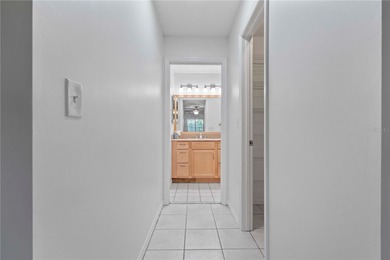 Welcome home to this spacious 2-bedroom, 2-bath residence that on Falcon Watch Golf Club in Florida - for sale on GolfHomes.com, golf home, golf lot