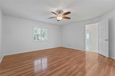 Welcome home to this spacious 2-bedroom, 2-bath residence that on Falcon Watch Golf Club in Florida - for sale on GolfHomes.com, golf home, golf lot