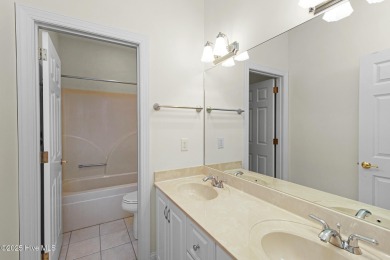 This stately brick home in Brandywine Bay enjoys a prime setting on Brandywine Bay Golf Club in North Carolina - for sale on GolfHomes.com, golf home, golf lot