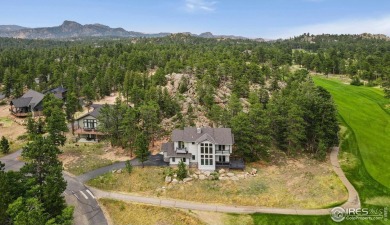 Welcome to this stunning mountain retreat nestled on the 17th on Fox Acres Country Club in Colorado - for sale on GolfHomes.com, golf home, golf lot
