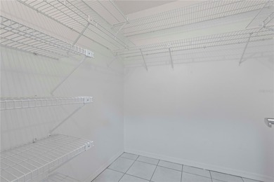 Welcome home to this spacious 2-bedroom, 2-bath residence that on Falcon Watch Golf Club in Florida - for sale on GolfHomes.com, golf home, golf lot