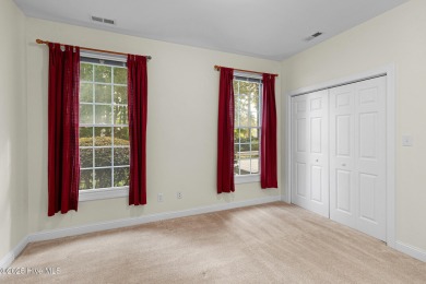 This stately brick home in Brandywine Bay enjoys a prime setting on Brandywine Bay Golf Club in North Carolina - for sale on GolfHomes.com, golf home, golf lot