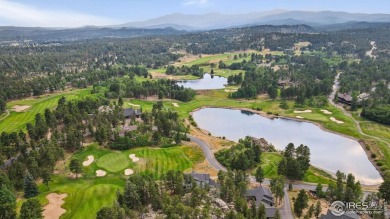 Welcome to this stunning mountain retreat nestled on the 17th on Fox Acres Country Club in Colorado - for sale on GolfHomes.com, golf home, golf lot