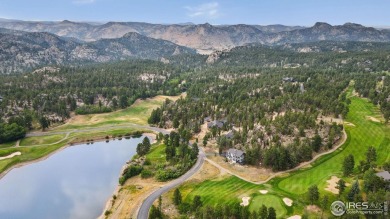 Welcome to this stunning mountain retreat nestled on the 17th on Fox Acres Country Club in Colorado - for sale on GolfHomes.com, golf home, golf lot