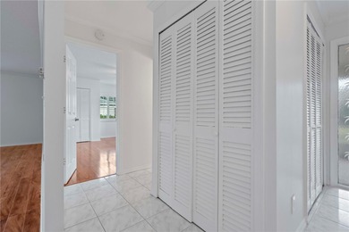 Welcome home to this spacious 2-bedroom, 2-bath residence that on Falcon Watch Golf Club in Florida - for sale on GolfHomes.com, golf home, golf lot