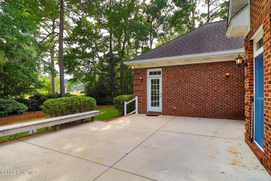 This stately brick home in Brandywine Bay enjoys a prime setting on Brandywine Bay Golf Club in North Carolina - for sale on GolfHomes.com, golf home, golf lot