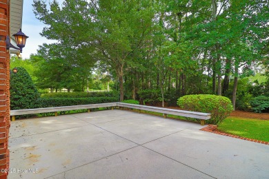 This stately brick home in Brandywine Bay enjoys a prime setting on Brandywine Bay Golf Club in North Carolina - for sale on GolfHomes.com, golf home, golf lot