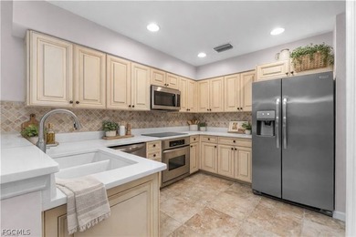 This first floor carriage home in Verandah is a blank canvas on Verandah Golf Course and Club in Florida - for sale on GolfHomes.com, golf home, golf lot