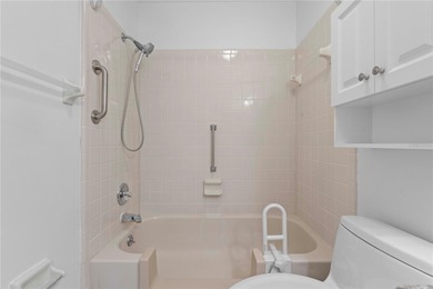 Welcome home to this spacious 2-bedroom, 2-bath residence that on Falcon Watch Golf Club in Florida - for sale on GolfHomes.com, golf home, golf lot