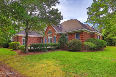 This stately brick home in Brandywine Bay enjoys a prime setting on Brandywine Bay Golf Club in North Carolina - for sale on GolfHomes.com, golf home, golf lot