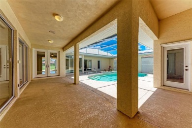 Florida Living At Its Finest! Explore this unique pool home with on Plantation Golf and Country Club in Florida - for sale on GolfHomes.com, golf home, golf lot