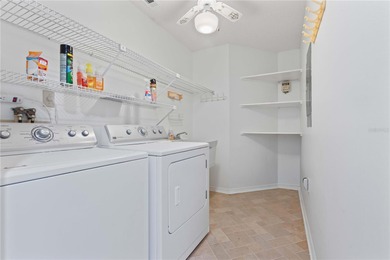 Welcome home to this spacious 2-bedroom, 2-bath residence that on Falcon Watch Golf Club in Florida - for sale on GolfHomes.com, golf home, golf lot