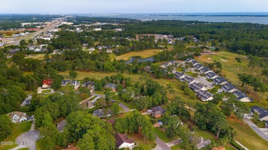 This stately brick home in Brandywine Bay enjoys a prime setting on Brandywine Bay Golf Club in North Carolina - for sale on GolfHomes.com, golf home, golf lot