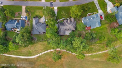 This stately brick home in Brandywine Bay enjoys a prime setting on Brandywine Bay Golf Club in North Carolina - for sale on GolfHomes.com, golf home, golf lot