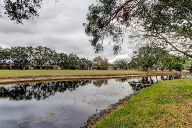 MUST SEE EAST LAKE WOODLANDS TREASURE! A LOVELY WATERFRONT, 4 on East Lake Woodlands Country Club in Florida - for sale on GolfHomes.com, golf home, golf lot