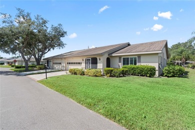 Welcome home to this spacious 2-bedroom, 2-bath residence that on Falcon Watch Golf Club in Florida - for sale on GolfHomes.com, golf home, golf lot