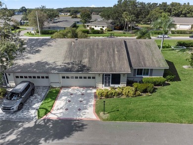 Welcome home to this spacious 2-bedroom, 2-bath residence that on Falcon Watch Golf Club in Florida - for sale on GolfHomes.com, golf home, golf lot
