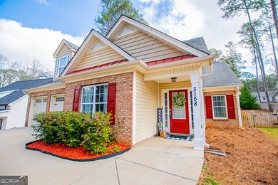 Elegant open-concept living in Fairfield Plantation. This on Fairfield Plantation Golf and Country Club in Georgia - for sale on GolfHomes.com, golf home, golf lot