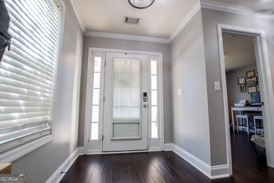 Elegant open-concept living in Fairfield Plantation. This on Fairfield Plantation Golf and Country Club in Georgia - for sale on GolfHomes.com, golf home, golf lot