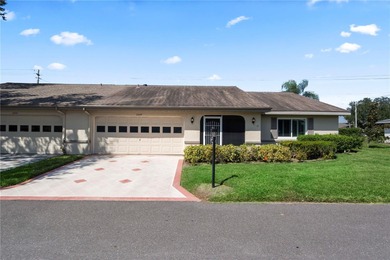 Welcome home to this spacious 2-bedroom, 2-bath residence that on Falcon Watch Golf Club in Florida - for sale on GolfHomes.com, golf home, golf lot