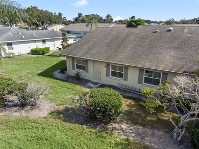 Welcome home to this spacious 2-bedroom, 2-bath residence that on Falcon Watch Golf Club in Florida - for sale on GolfHomes.com, golf home, golf lot