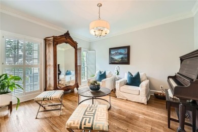 Nestled on a spacious meticulously landscaped site in East Cobbs on Atlanta Country Club in Georgia - for sale on GolfHomes.com, golf home, golf lot