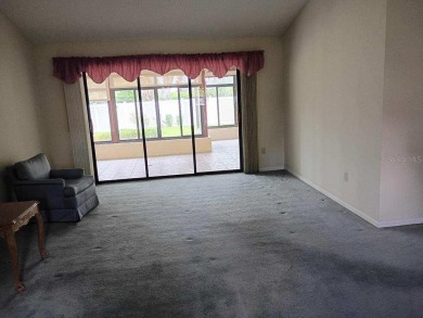 This meticulously maintained one owner home offers over 2,900 on The Grand Club - Pine Lakes Course in Florida - for sale on GolfHomes.com, golf home, golf lot