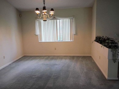 This meticulously maintained one owner home offers over 2,900 on The Grand Club - Pine Lakes Course in Florida - for sale on GolfHomes.com, golf home, golf lot