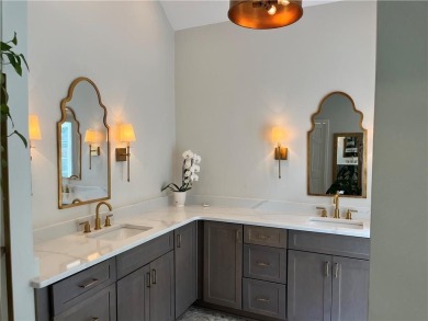 Nestled on a spacious meticulously landscaped site in East Cobbs on Atlanta Country Club in Georgia - for sale on GolfHomes.com, golf home, golf lot