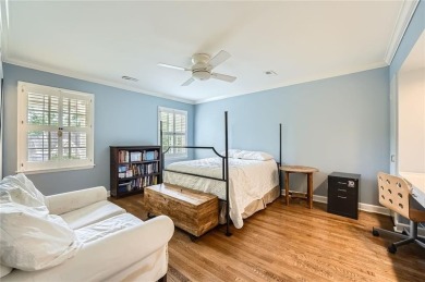 Nestled on a spacious meticulously landscaped site in East Cobbs on Atlanta Country Club in Georgia - for sale on GolfHomes.com, golf home, golf lot