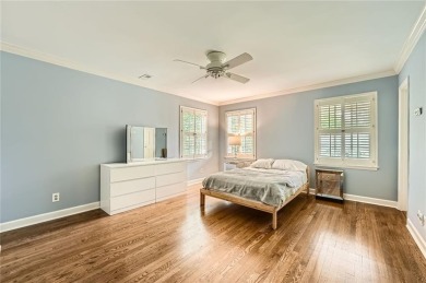 Nestled on a spacious meticulously landscaped site in East Cobbs on Atlanta Country Club in Georgia - for sale on GolfHomes.com, golf home, golf lot